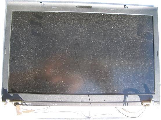 A ThinkPad T530 LCD screen removed from the body of the laptop, being offered