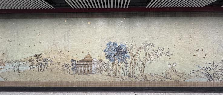 same tiled wall, different section, with traditional Chinese landscape art