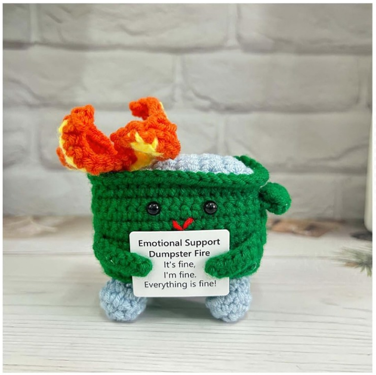 A crocheted "Emotional Support Dumpster Fire" with black pearls as eyes "It's fine, I'm fine. Everything is fine!"