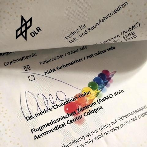 Unusually colorful official document of a medical test. Result: "colour safe"