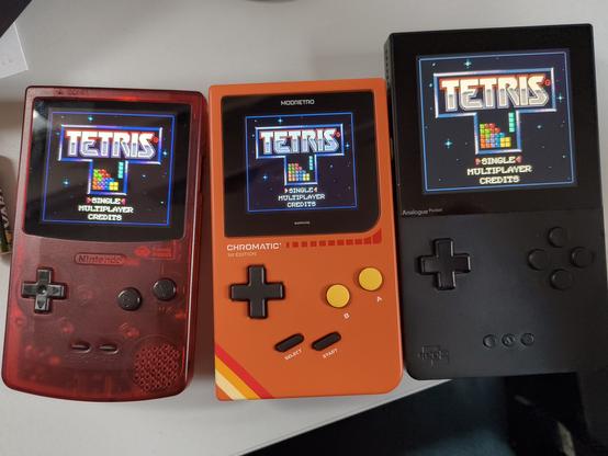 A FPGBC, a Modretro Chromatic and a Analogue Pocket playing Chromatic Tetris.