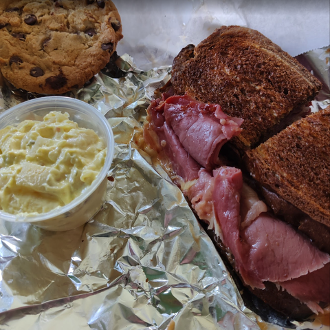 A Southwest Market Reuben with Potato Salad and a Chocolate Chip Cookie.