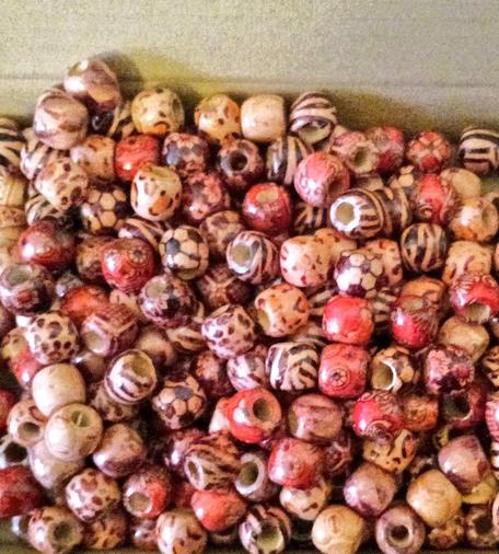 Painted wooden beads in earth colours