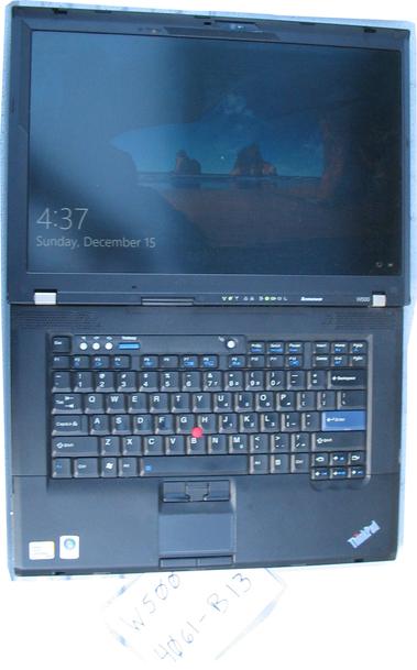 An open ThinkPad W500 mobile workstation, showing the screen and keyboard with the Windows 10 login screen