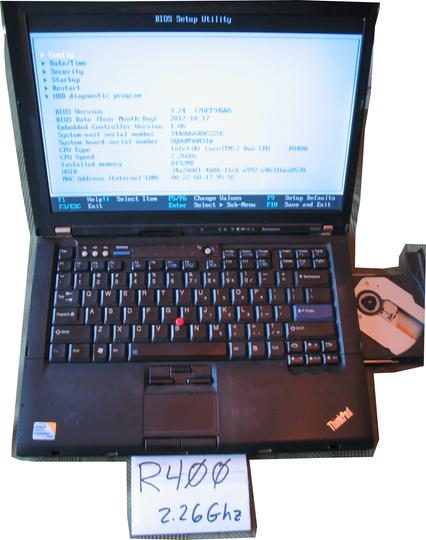 A ThinkPad R400 booted into the BIOS, showing the configuration and the CD/DVD tray open