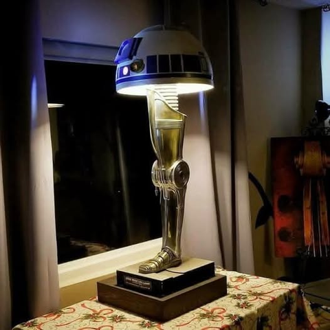 A lamp made with the leg of C-3 protocol droid and the shade made from the dome of an R2 unit, spoofing a famous lamp from "A Christmas Story"