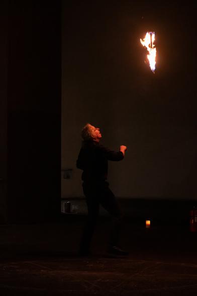 Me tossing a Samoan fireknife high into the air.