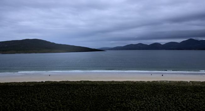 Losgaintir beach on the Isle of Harris with machair, golden sand and sea loch