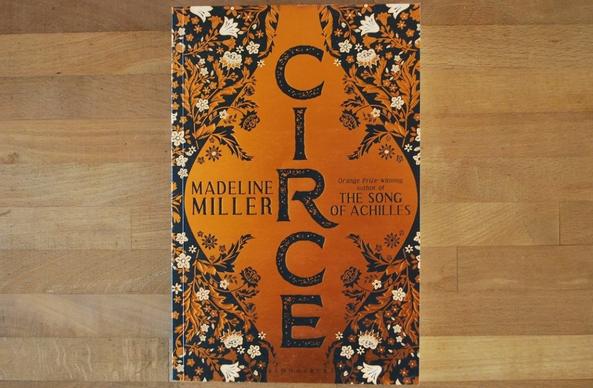 The cover of this edition of Circe shows the title in black letter surrounded by golden, with flowers and vines growing from the four corners