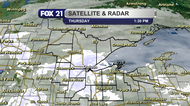 The satellite and radar over the Northland at 1:30 p.m. on Thursday, December 19, 2024, shows show showers over the southern two-thirds of the region, excluding the South Shore snowbelt region.  Clouds persist over the entire region.