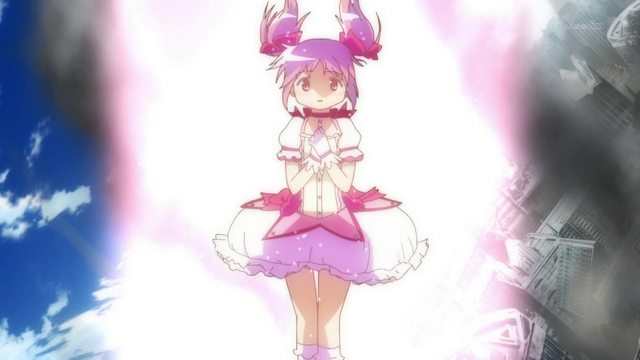 Kaname Madoka glowing with her transformation