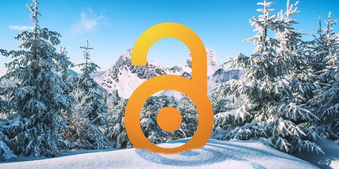 The open access logo in an orange color standing in the middle of a wintery forest with snowy mountains in the background.