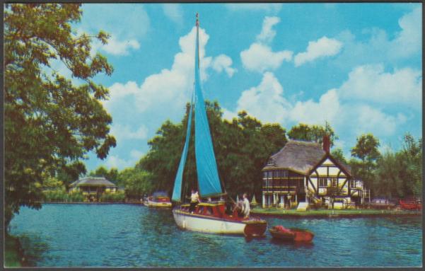 Printed colour postcard showing a view of the riverside bungalows at Wroxham on the Norfolk Broads.
Published by The Photographic Greeting Card Co Ltd, London, No 686, c.1960s.
Postally unused.
Excellent condition, with minimal corner bumps.