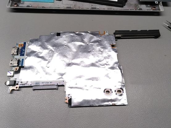 Back side of PCB, covered in foil. They has some serious EMC issues I guess