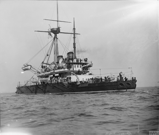 HMS Thunderer was the second of two Devastation-class ironclad turret ships built for the Royal Navy along with her sister HMS Devastation (1871). Launched on 25 March 1872, she was completed on 26 May 1877.

While under going trials on 14 July 1876, Thunderer suffered a disastrous boiler explosion which killed 45 people. After repairs and commissioning, she was assigned to the Channel Squadron and then the Mediterranean.

On 2 January 1879, the left 12-inch 38 ton gun in the forward turret exploded during gunnery practice in the Sea of Marmora, killing 11 and injuring a further 35. This was probably caused when the muzzle-loading gun had been double-loaded following a misfire.

In January 1888, she was assigned to the Portsmouth Reserve, where she underwent a modernsation the following year. Her muzzle-loading 12-inch guns were replaced by 10-inch breech-loading guns. To improve her defence against torpedo boats, her Nordenfelt guns were replaced by six quick-firing (QF) 6-pounder 2.2 in (57 mm) and eight QF 3-pounder 1.9 in (47 mm) Hotchkiss guns. Thunderer’s machinery was replaced by inverted triple-expansion steam engines and cylindrical boilers.

Rejoining the Mediterranean Fleet in March 1891, she was forced to return home in September 1892 with persistent boiler problems and she was reduced to the Chatham reserve. Thunderer became the guard ship at Pembroke Dock in May 1895 and remained there until she returned to the Chatham reserve in December 1900.