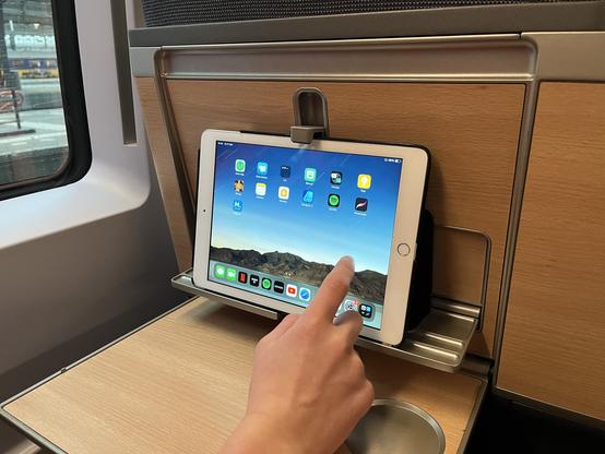 iPad in the dedicated tablet and smartphone holder.