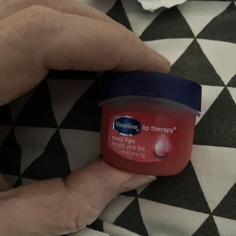 A teeny tiny jar of Vaseline lip balm