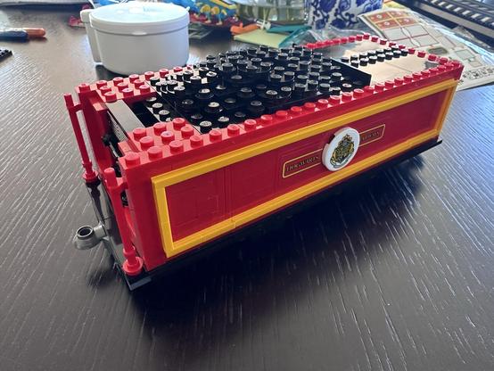 The coal cart is mostly complete, including layers of coal visible from the top. But it still needs wheels!