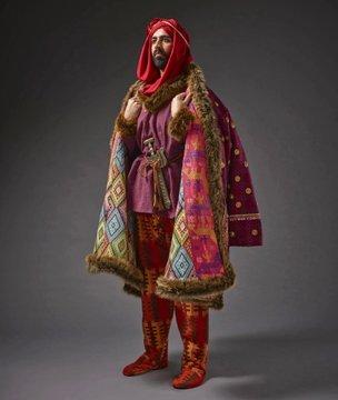 Recreation of a Persian rider from 500 BC, wearing a fur-lined and highly decorated gaunaka coat