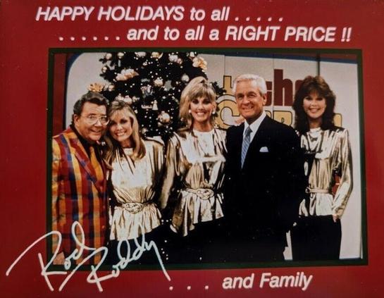 Rod, Bob and the price is right models all pose by a christmas tree and the big doors.