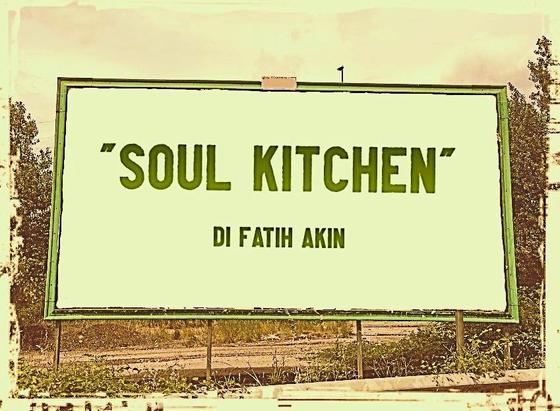 L'immagine digitale riproduce un cartellone pubblicitario stradale con la scritte "Soul Kitchen”di Fatih Akın".