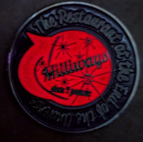 Milliways side of the 38c3 challenge coin - bad camera
