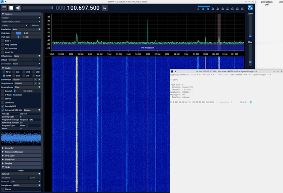 Waterfall view of sdrpp showing the fm broadcast band. There is terminal window on top of sdrpp showing the sox playback interface