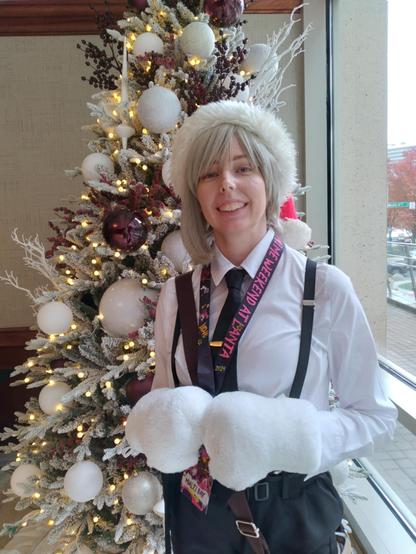 Atsushi Nakajima cosplayer standing beside a christmas tree.