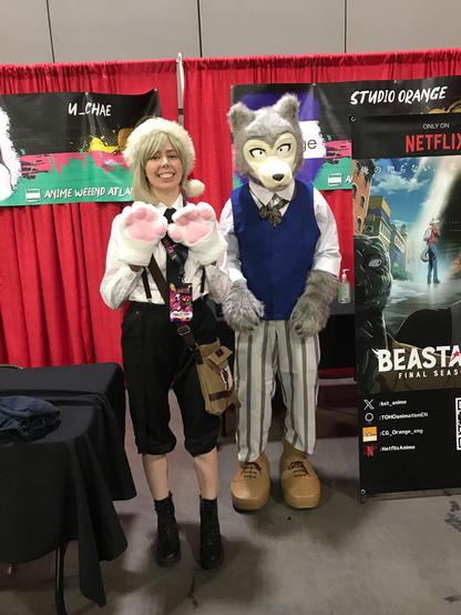 Atsushi cosplayer standing next to Legoshi from Beastars at a meet and greet