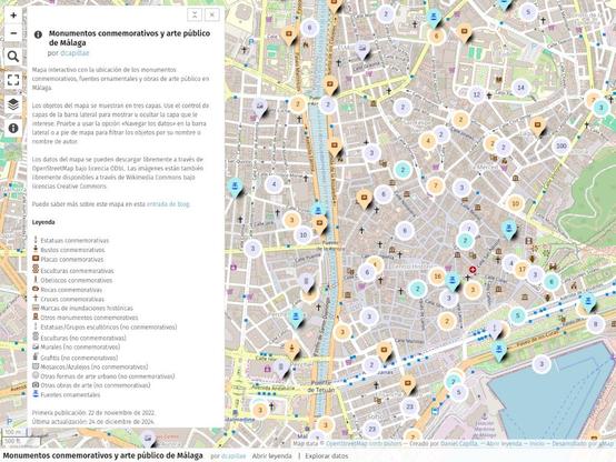 Captura de pantalla del mapa de monumentos conmemorativos y arte público de Málaga en uMap. La imagen muestra un mapa digital de Málaga donde aparecen representadas mediante marcadores e iconos las ubicaciones y tipologías de los monumentos conmemorativos, obras de arte público y fuentes ornamentales de Málaga. A la izquierda de la imagen, una ventana emergente muestra una descripción del contenido y funcionalidades del mapa.