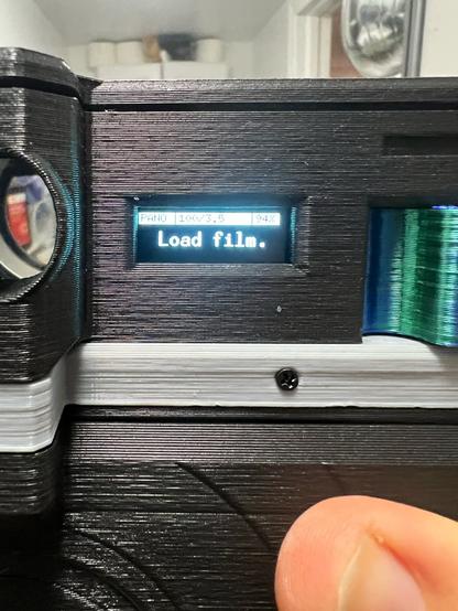 The rear screen of the MRF, showing the big text “load film” and also that the pano mask is selected, the 100 3.5 is selected, and battery is at 94%!!