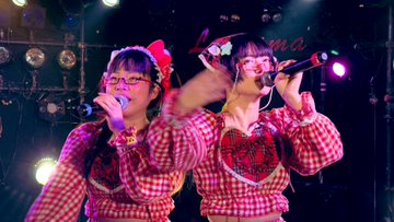 Menma and Chiyo singing on stage
