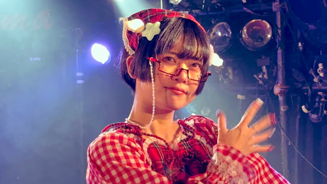 Closeup of Chiyo. Wearing "Menma-sytle" half glasses.