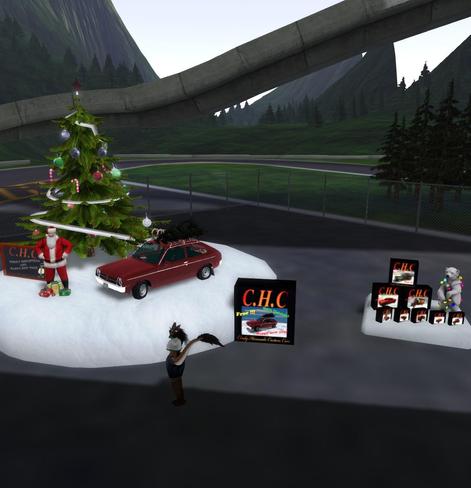 Free car as Christmas Gift in front of a X-Mas tree and also gifts from the previous years and a furry woman posing nearby.