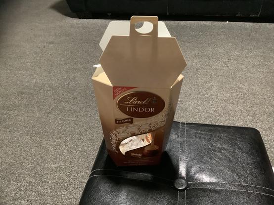 The box of Linder tiramisu chocolates that I am eating
