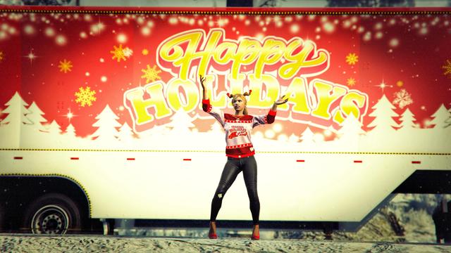 A screenshot I took in the video game GTA Online using the Rockstar Editor. It shows my second character (female) in a festive outfit waving at the viewer while the Happy Holidays truck is passing by in the background.