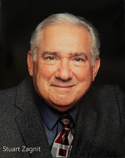 A photograph of Stuart Zagnit, the original voice of Professor Oak from 1998 to 2008