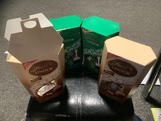 Lindor tiramisu and mint chocolates in different states of being eaten