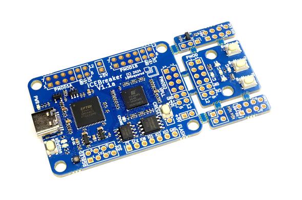 A blue PCB on white background. The PCB has a shape of a robot with flappy ears. It has a USB-C connector, FTDI chip and an iCE40up5k FPGA on board. A large SPI flash chip can handle the bitstream as well as additional application data. A PSRAM SPI chip can be used on the same buss as well as communication with the computer at 60MBit!