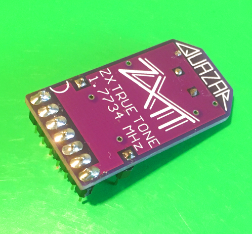 The small ZXTT circuit board, in funky purple colour.