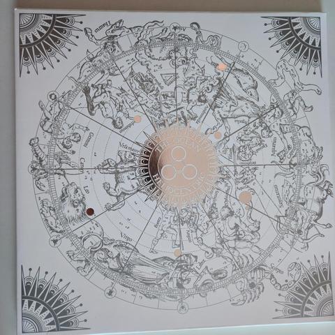The Ocean's "Heliocentric" double gatefold LP, front cover: silver foil on white