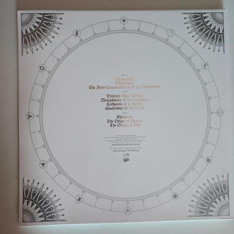 The Ocean's "Heliocentric" double gatefold LP, back cover: silver foil on white