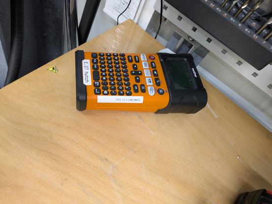 a label maker with "this is a label maker" label