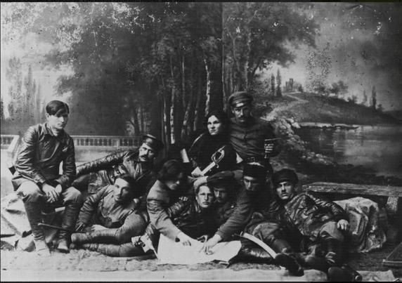 Nestor Makhno and his lieutenants. From left to right Bottom row: I. Lyuty, P. Belochub, N. Makhno, V. Kurylenko, F. Schus, Y. Ozerov, and A. Chubenko Top row: A. Olkhovik, P. Puzanov, and Novikov Berdyansk, 1919. By Unknown photographer - http://varjag-2007.livejournal.com/2110190.html., Public Domain, https://commons.wikimedia.org/w/index.php?curid=85909068