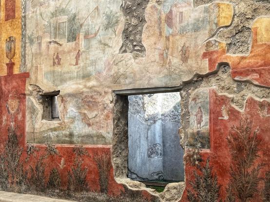 Colourful painting on the walls of the House of Octavius Quartio Pompeii
