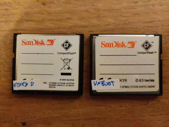 The backs of the same two compact flash cards. They were manufactured a year apart.