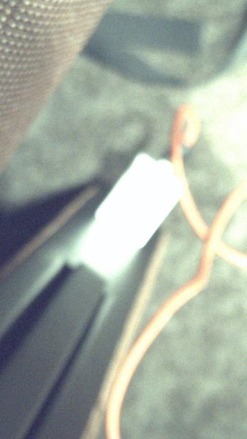 Power adapter plugged into a power outlet in CCH Saal 1.