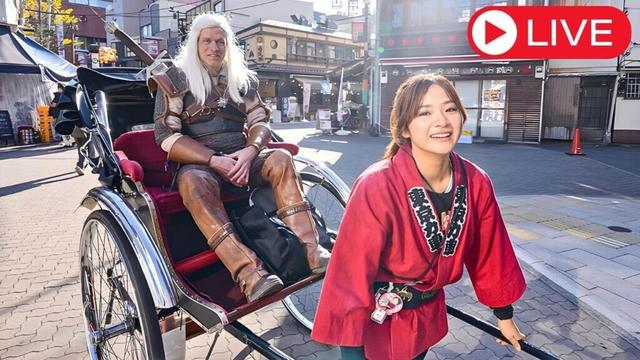 Cute Japanese Girl Carries The Witcher Through Tokyo