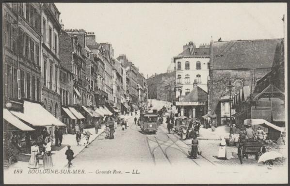 Printed monochrome postcard showing an animated view of the Grande Rue at Boulogne-sur-Mer in France.
Published by Lévy Fils et Cie, Paris, No LL 189, c,1910.
Postally unused.
Very good condition, with very slight corner bumps and light album marks.