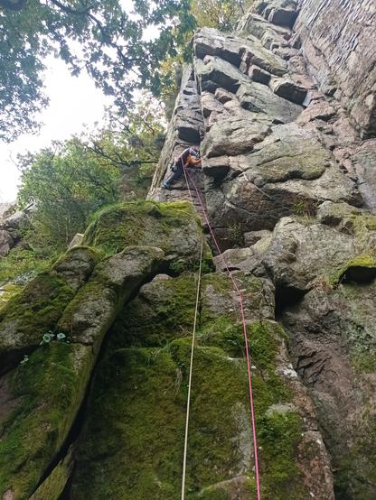 Looking up at a tall (30m+), striking, granite corner. On the left return of the corner is an arete with a shallower corner above a large, moss-covered block. a climber is bridging wide in the cornerabove the block, mostly obscured by the split legs. half ropes trail down from the climber thrugh other protection.

So this one is in here for a few reasons: Firstly, The Dewerstone is a spectacular crag in a lovely setting and this was a extremely fun lead with a great partner (who also let me crash at his place for the night). If you haven't, I thoroughly recommend going. Also, this was the day after I passed my Foundation Coach qualification with the excellent Garland Mountaineering in Exeter - the afore-mentioned mate happens to live down there so I managed to turn it into a climbing trip too... The same thing I tried when I did my RCI in August, except that failed because of the sucky British weather (seriously? P**sing rain to the point of zero visibility in AUGUST???), so this kinda represents my RCI pass too.